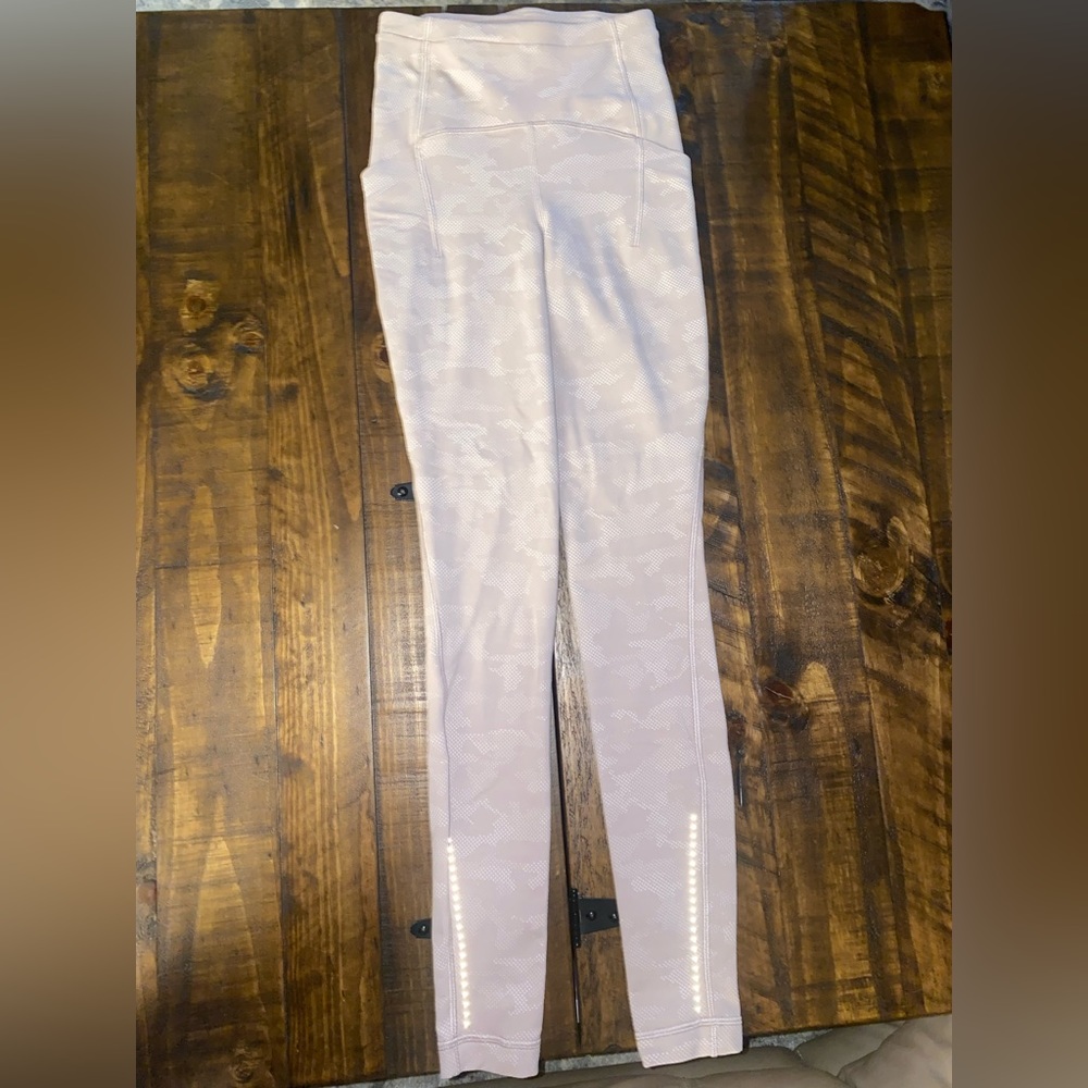 size 0 lululemon light pink and white camo leggings
